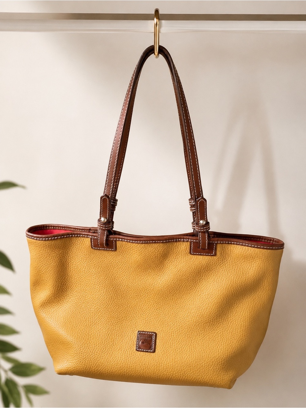 Dooney and Bourke Mustard color Pebbled Leather Tote Bag with Brown Trim